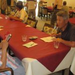 会員の名前と顔を覚えるため参加費集めを担当の半田さん